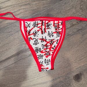 white character print string bikini bottoms
